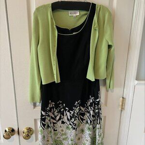 Adorable mid-length dress with matching 3/4 length sweater and eyelet detail